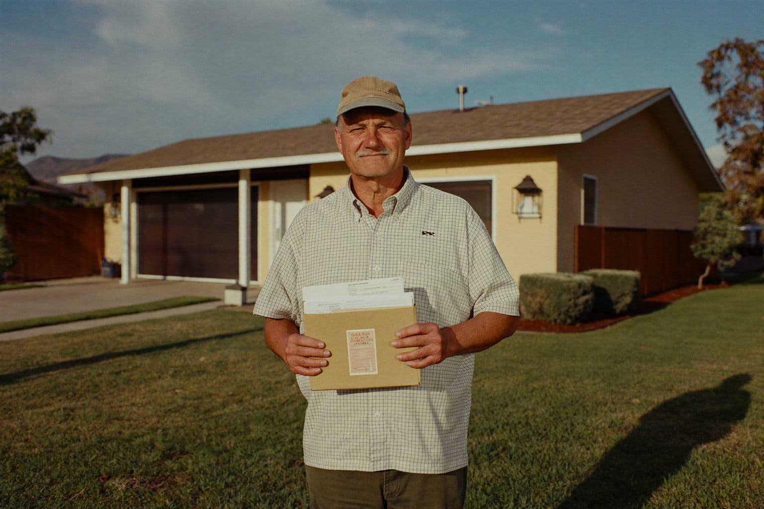 A relieved homeowner outside her house after accepting a cash offer